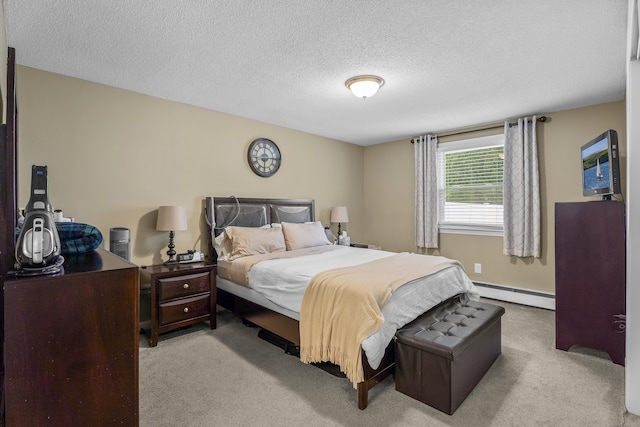 15 Arlington Rd, Windsor Locks, CT 06096 - bedroom with a baseboard heating unit, light carpet, and a textured ceiling