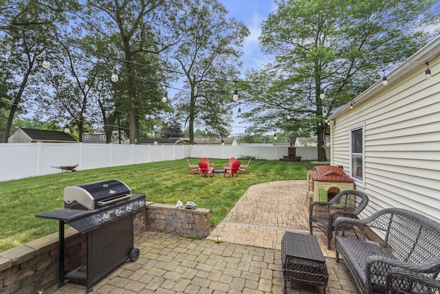 15 Arlington Rd, Windsor Locks, CT 06096 - fenced backyard with a grill and a patio