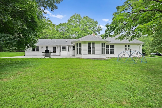9 Old Logging Rd, Stamford, CT 06903 - rear view of property with a patio area, a yard, a chimney, and roof with shingles