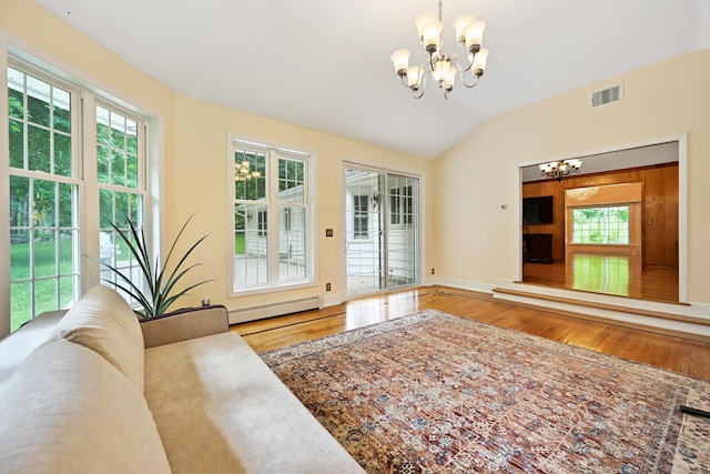9 Old Logging Rd, Stamford, CT 06903 - unfurnished living room featuring a chandelier, wood finished floors, lofted ceiling, and a baseboard radiator