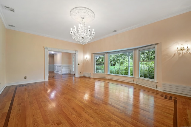9 Old Logging Rd, Stamford, CT 06903 - unfurnished room with a chandelier, wood finished floors, and ornamental molding