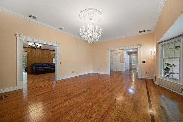 9 Old Logging Rd, Stamford, CT 06903 - spare room with a chandelier, wood finished floors, and ornamental molding