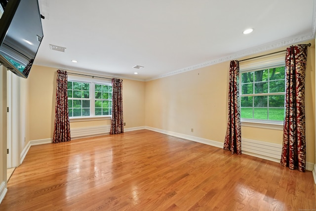 9 Old Logging Rd, Stamford, CT 06903 - empty room featuring ornamental molding, light wood-style floors, and recessed lighting