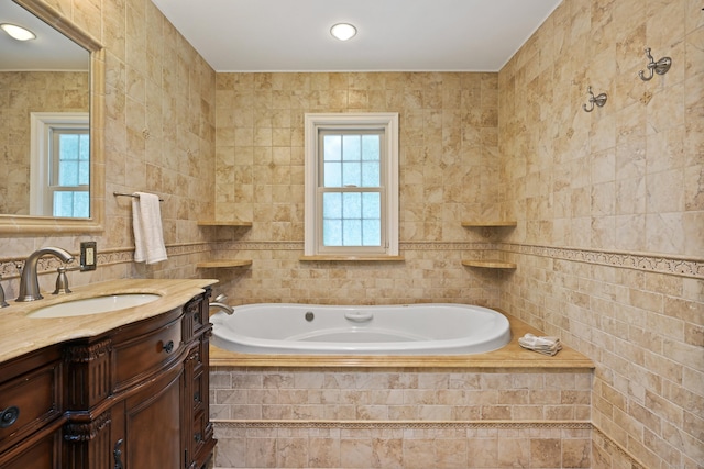 9 Old Logging Rd, Stamford, CT 06903 - bathroom featuring tile walls, vanity, and a garden tub