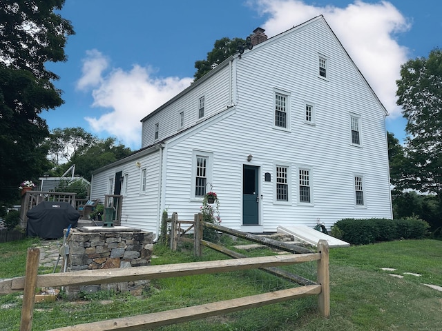 37 Lane St, Shelton, CT 06484 - view of front of house featuring a front yard and a chimney