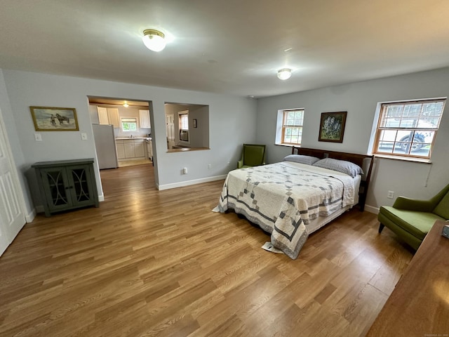37 Lane St, Shelton, CT 06484 - bedroom featuring freestanding refrigerator and wood finished floors