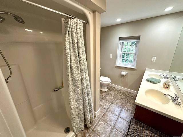 37 Lane St, Shelton, CT 06484 - bathroom featuring a shower stall, double vanity, tile patterned flooring, and recessed lighting