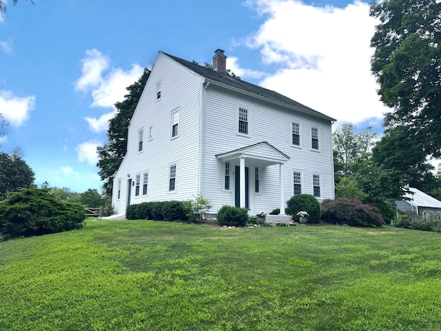 37 Lane St, Shelton, CT 06484 - colonial-style house with a front lawn and a chimney
