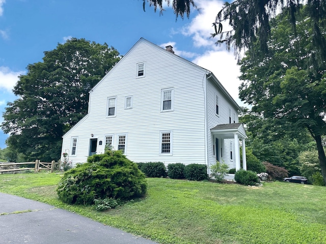 37 Lane St, Shelton, CT 06484 - view of home's exterior featuring a chimney