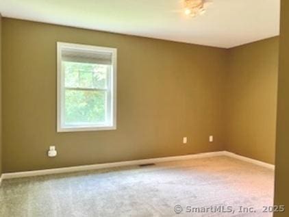 1929 Logans Way, Windsor, CT 06095 - unfurnished room featuring carpet and baseboards