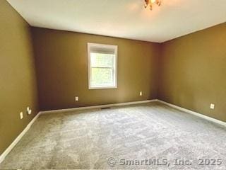 1929 Logans Way, Windsor, CT 06095 - empty room with baseboards and carpet