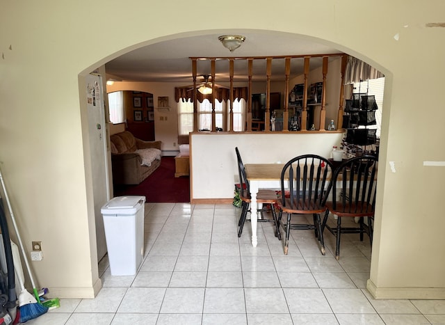 17 Ohear Ave, Enfield, CT 06082 - tiled dining space featuring ceiling fan and arched walkways