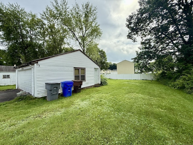 17 Ohear Ave, Enfield, CT 06082 - view of yard featuring a detached garage and an outdoor structure