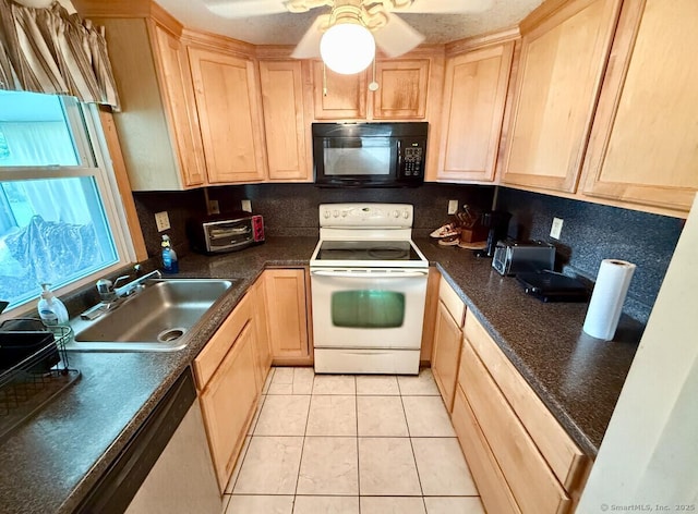 17 Ohear Ave, Enfield, CT 06082 - kitchen featuring black microwave, electric range, light brown cabinets, dark countertops, and decorative backsplash