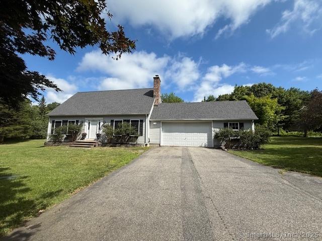 67 Bergendahl Dr, Griswold, CT 06351 - view of front of property with an attached garage, asphalt driveway, a front lawn, and a chimney