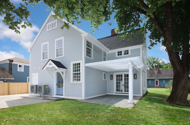 65 Water St, Guilford, CT 06437 - back of house with french doors, a patio area, a chimney, and roof with shingles