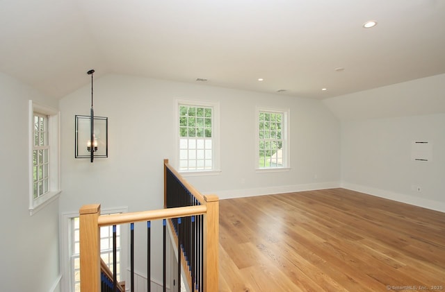 65 Water St, Guilford, CT 06437 - additional living space featuring vaulted ceiling, light wood-type flooring, recessed lighting, and a chandelier