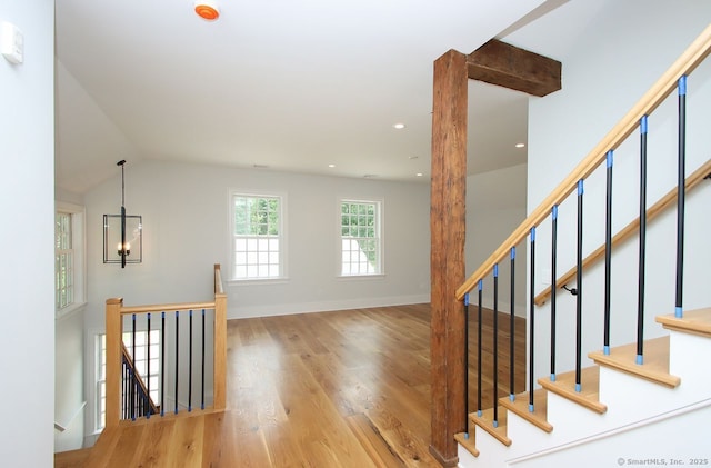 65 Water St, Guilford, CT 06437 - staircase with wood finished floors, a chandelier, and recessed lighting