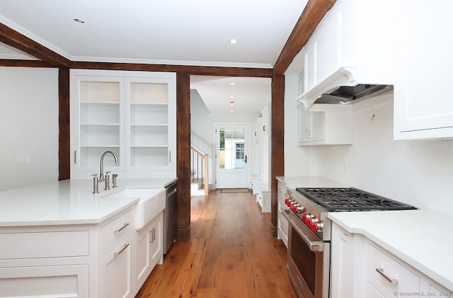 65 Water St, Guilford, CT 06437 - kitchen with stainless steel appliances, white cabinets, light wood finished floors, and light countertops