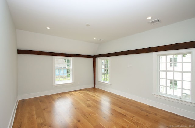 65 Water St, Guilford, CT 06437 - spare room featuring plenty of natural light, light wood-style floors, recessed lighting, and lofted ceiling