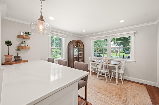 73 Water St, Glastonbury, CT 06073 - dining room featuring wood finished floors, ornamental molding, and recessed lighting
