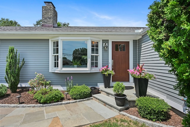 68 William St, Norwalk, CT 06851 - doorway to property featuring a chimney