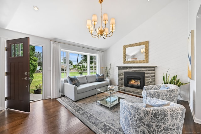 68 William St, Norwalk, CT 06851 - living area with vaulted ceiling, wood finished floors, a glass covered fireplace, and a chandelier