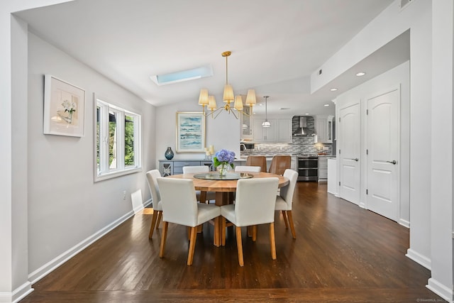 68 William St, Norwalk, CT 06851 - dining room with a chandelier, dark wood finished floors, recessed lighting, and lofted ceiling