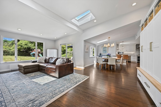 68 William St, Norwalk, CT 06851 - living area with a chandelier, dark wood-style floors, a skylight, and recessed lighting