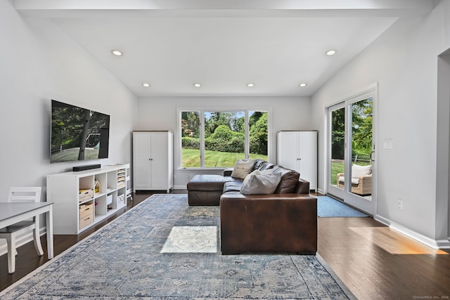 68 William St, Norwalk, CT 06851 - living area with wood finished floors, vaulted ceiling, and recessed lighting