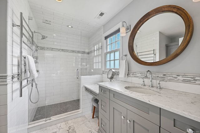 68 William St, Norwalk, CT 06851 - bathroom featuring a shower stall, vanity, marble look tile flooring, and recessed lighting