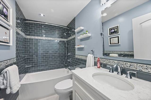 68 William St, Norwalk, CT 06851 - full bathroom featuring tile walls, vanity, tub / shower combination, and recessed lighting