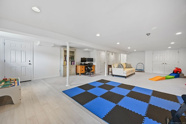 68 William St, Norwalk, CT 06851 - playroom with an office area, recessed lighting, light wood-style flooring, and light colored carpet