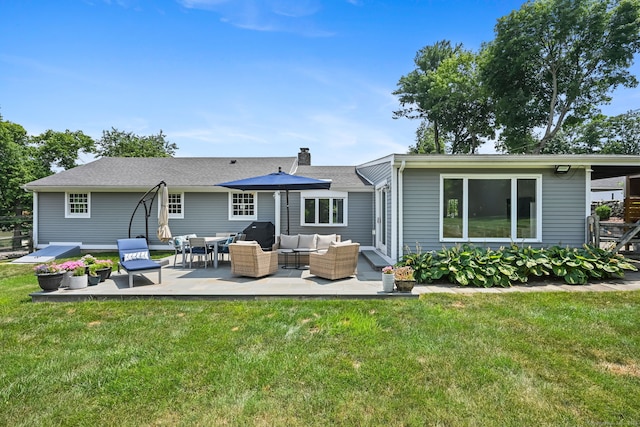 68 William St, Norwalk, CT 06851 - back of house with an outdoor hangout area, a chimney, a yard, and a patio area