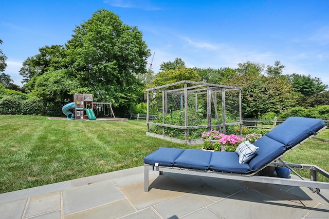 68 William St, Norwalk, CT 06851 - view of green lawn with a playground, a garden, and a patio