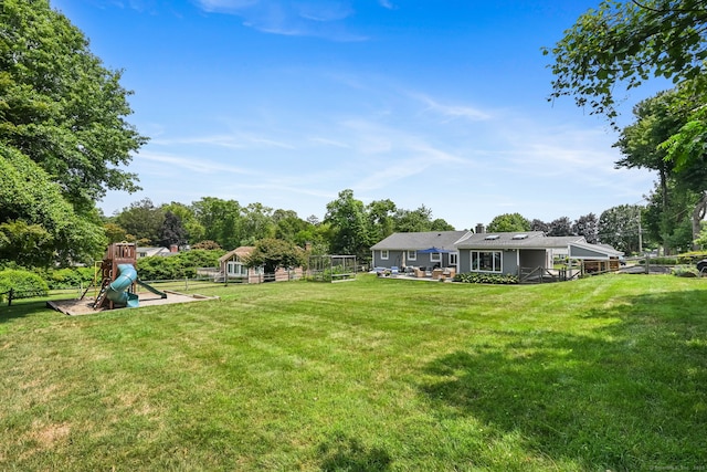 68 William St, Norwalk, CT 06851 - view of yard featuring a playground and view of scattered trees