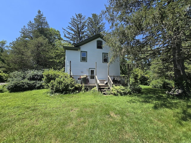 16AND23 Farrell Rd, Newtown, CT 06470 - rear view of house with a yard and a wooden deck