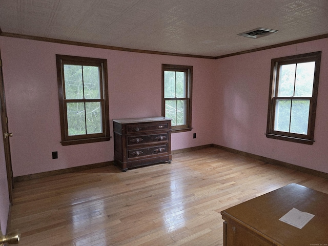 16AND23 Farrell Rd, Newtown, CT 06470 - unfurnished room with crown molding, healthy amount of natural light, and light wood-style flooring
