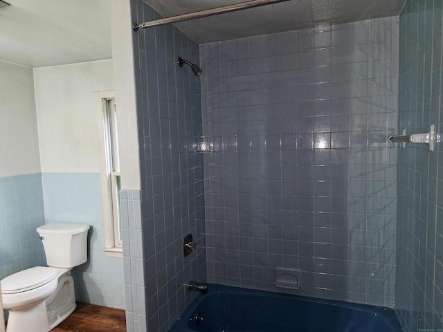 16AND23 Farrell Rd, Newtown, CT 06470 - full bath with wood finished floors, tile walls, tub / shower combination, and wainscoting