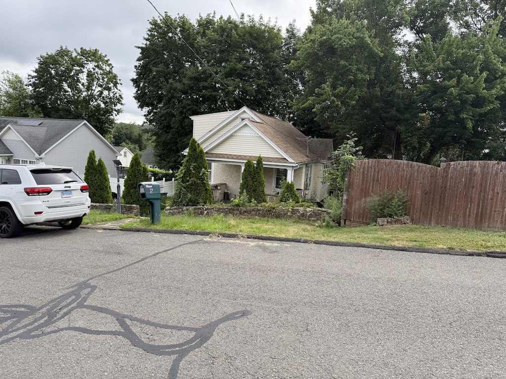 6 Lane Ave, Trumbull, CT 06611 - view of asphalt road featuring curbs