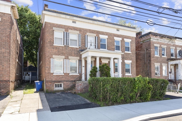 276 Bond St, Bridgeport, CT 06610 - view of front facade featuring brick siding