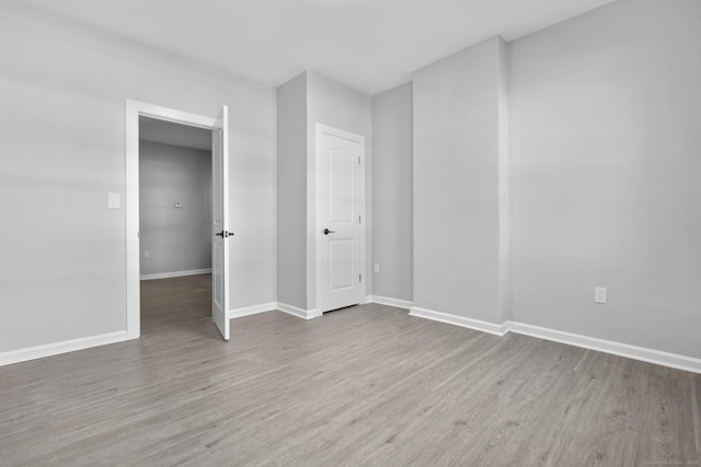 276 Bond St, Bridgeport, CT 06610 - unfurnished bedroom with wood finished floors