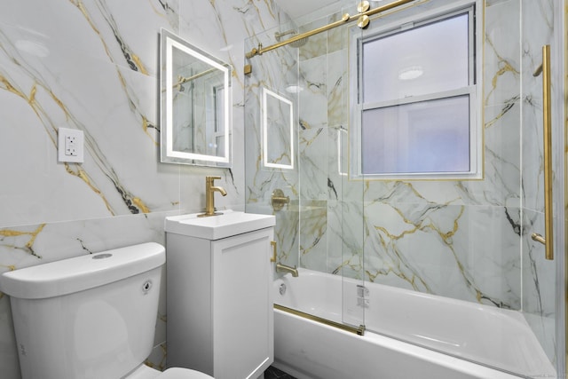 276 Bond St, Bridgeport, CT 06610 - bathroom with tile walls, vanity, and enclosed tub / shower combo