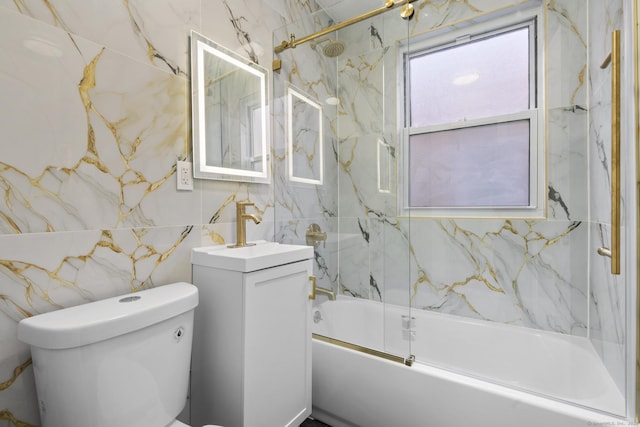 276 Bond St, Bridgeport, CT 06610 - full bath featuring tile walls, vanity, and shower / bathtub combination
