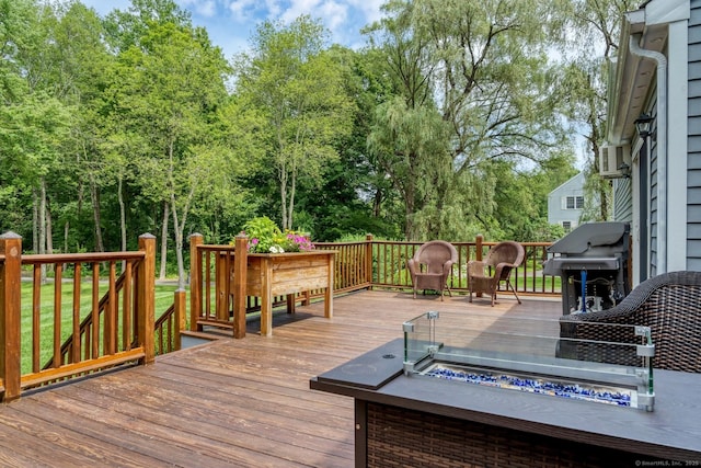 35 Pheasant Ln, Ridgefield, CT 06877 - wooden deck with a grill and view of wooded area
