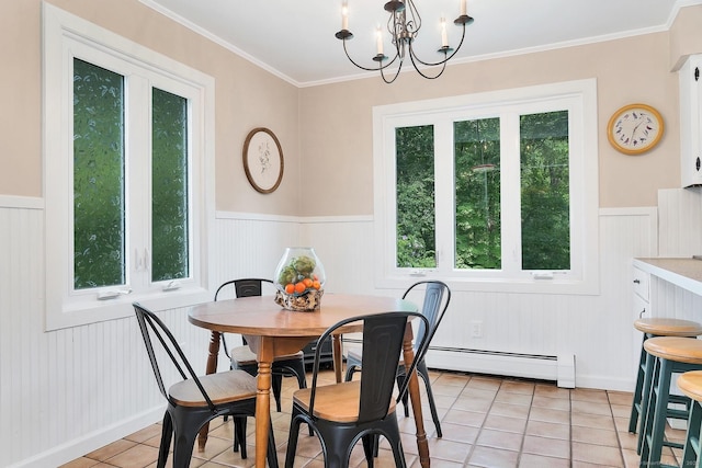 35 Pheasant Ln, Ridgefield, CT 06877 - dining space with baseboard heating, wainscoting, light tile patterned floors, a chandelier, and crown molding