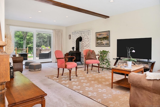 35 Pheasant Ln, Ridgefield, CT 06877 - living room featuring a wood stove, light colored carpet, recessed lighting, and beamed ceiling