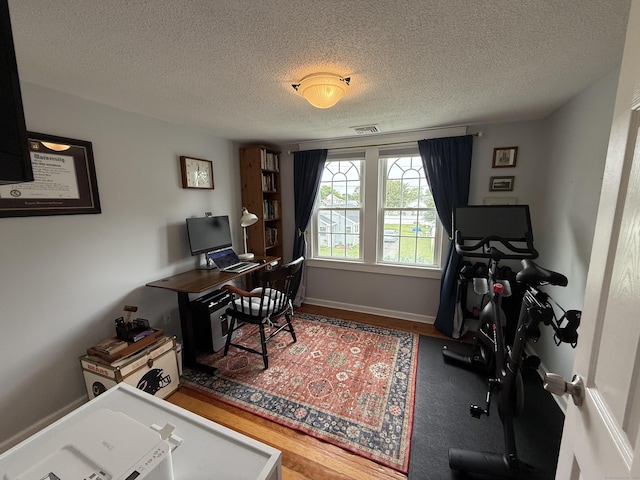 19 Hartford Ave, Old Saybrook, CT 06475 - home office with a textured ceiling and baseboards