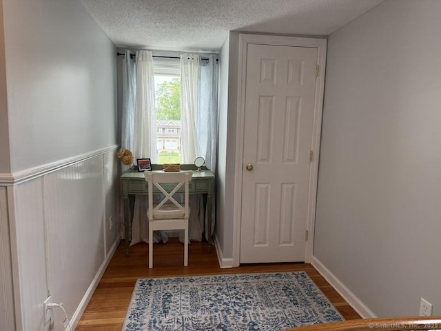 19 Hartford Ave, Old Saybrook, CT 06475 - office featuring light wood-type flooring and a textured ceiling