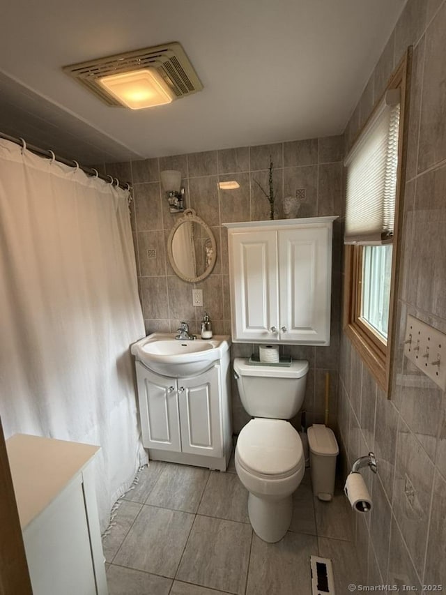 19 Hartford Ave, Old Saybrook, CT 06475 - full bathroom featuring tile walls, vanity, curtained shower, and tile patterned flooring